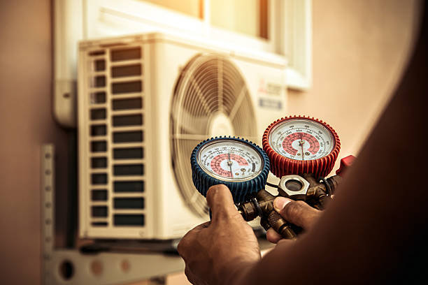 Professional Hvac technician working in Ash, NC
